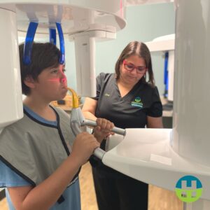 3D Digital Imaging for Airway Orthodontics in New Orleans Hamada Orthodontics - Hamada Orthodontics A young patient receiving 3D digital imaging at Hamada Orthodontics while a team member assists. This advanced imaging technology allows Dr. Hamada to evaluate airway structure, jaw development, and dental alignment as part of a comprehensive airway orthodontic evaluation in New Orleans.