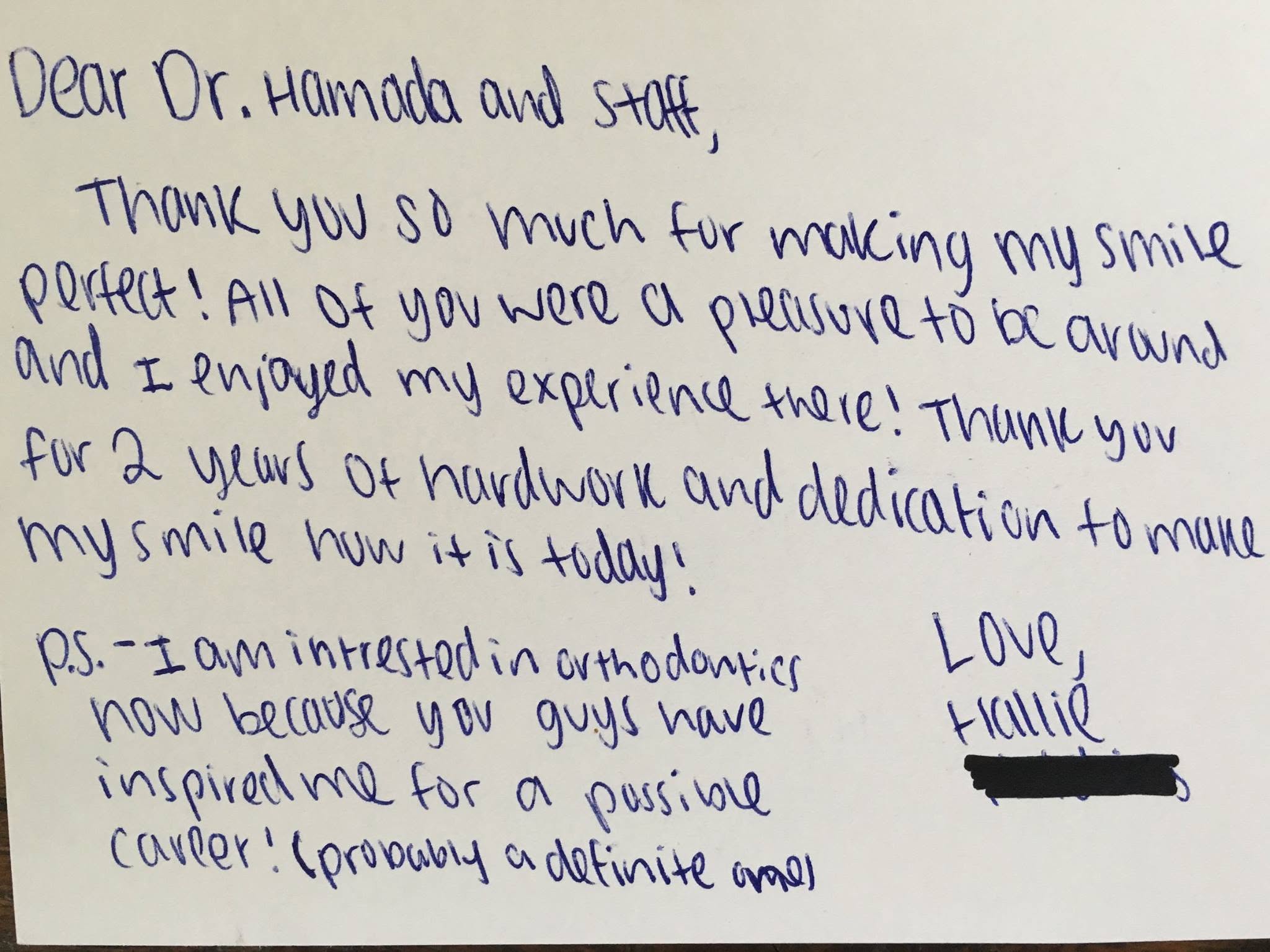Handwritten thank-you note from a Hamada Orthodontics patient thanking Dr. Hamada and staff for her finished smile after two years of treatment